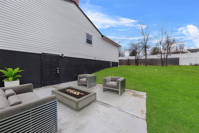 view of patio featuring an outdoor living space with a fire pit