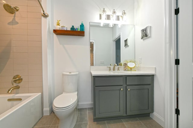 full bathroom with tile patterned floors, tiled shower / bath combo, toilet, and vanity