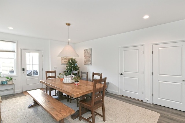 dining space featuring dark hardwood / wood-style floors