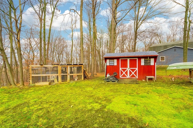 view of outdoor structure with a yard