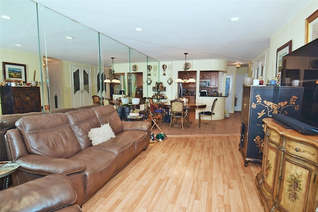 living room with light hardwood / wood-style floors