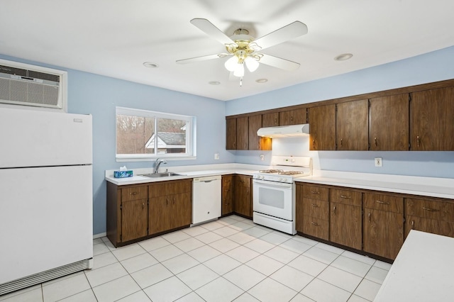 kitchen with ceiling fan, white appliances, sink, and a wall unit AC