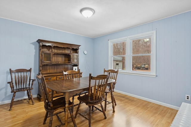 dining area with light hardwood / wood-style flooring