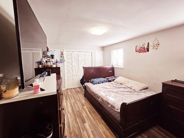 bedroom featuring light hardwood / wood-style floors