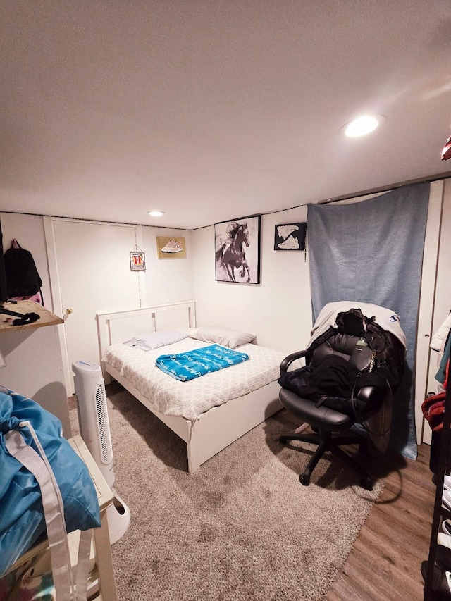 bedroom featuring hardwood / wood-style floors