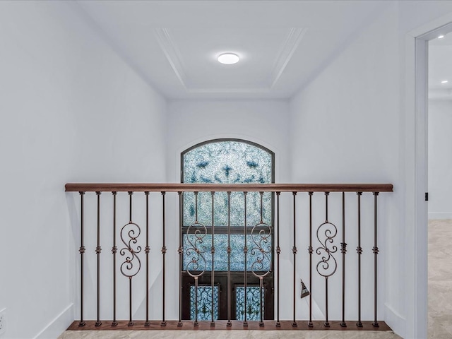 interior space featuring a raised ceiling