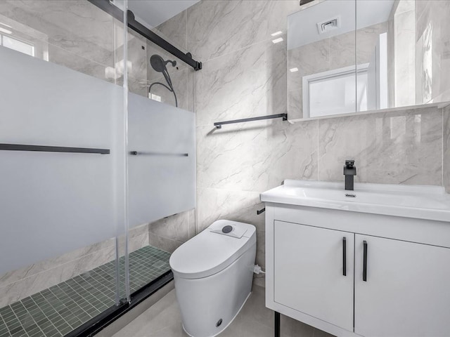 bathroom featuring vanity, toilet, and an enclosed shower