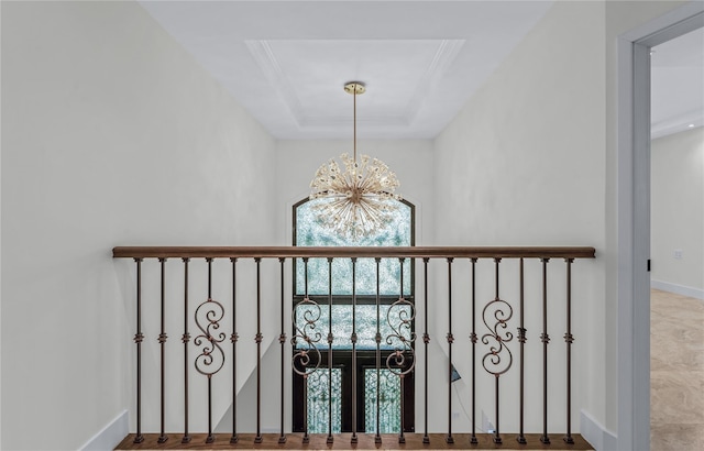 233-12 Bay St, Douglaston, NY 11363 - room details with a raised ceiling, a chandelier, and baseboards