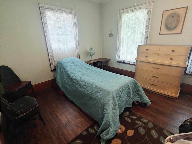 bedroom featuring dark hardwood / wood-style floors