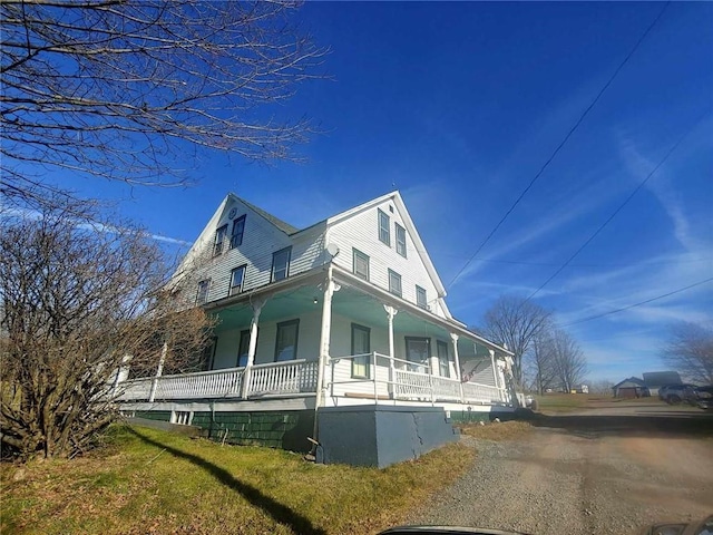 view of home's exterior with a porch