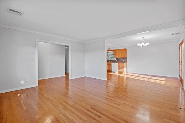 interior space with a chandelier, light hardwood / wood-style flooring, and crown molding