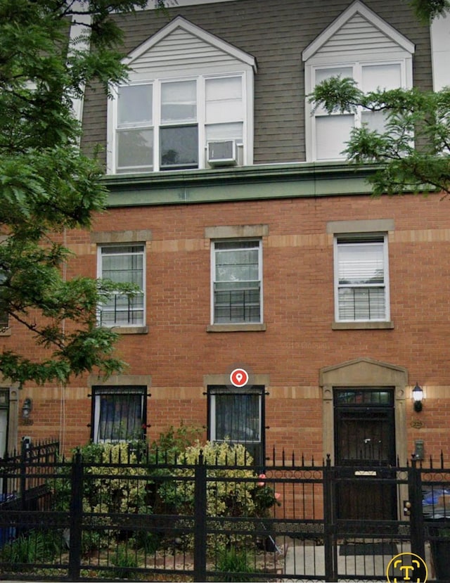 view of front facade featuring cooling unit