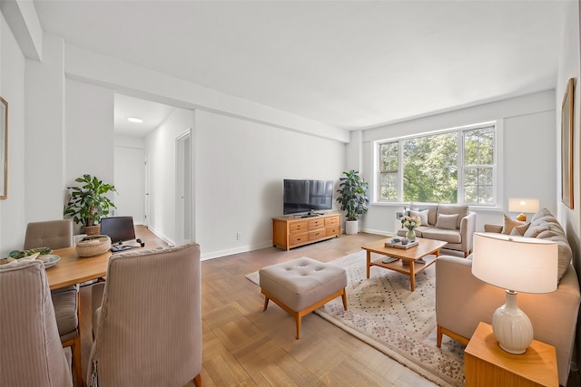 living room featuring parquet floors