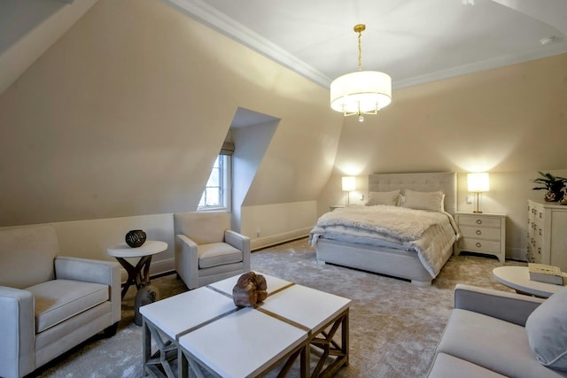 carpeted bedroom with crown molding and vaulted ceiling