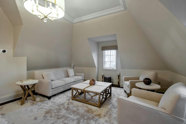 living room with a chandelier, light hardwood / wood-style floors, and ornamental molding