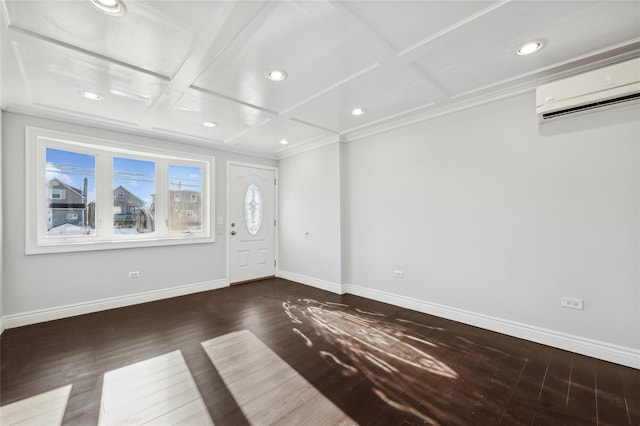 interior space with a wall mounted AC, crown molding, dark wood-type flooring, and coffered ceiling