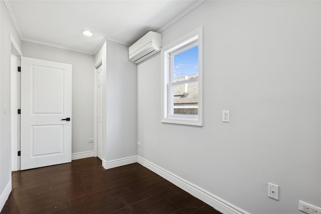 hallway with dark hardwood / wood-style flooring, a wall mounted AC, and ornamental molding