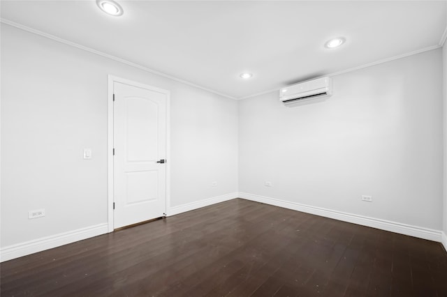 unfurnished room with dark hardwood / wood-style flooring, crown molding, and a wall mounted AC