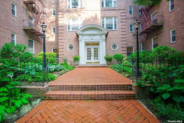 entrance to property featuring french doors