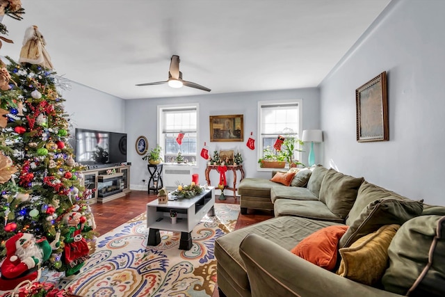 living room featuring radiator, ceiling fan, and hardwood / wood-style flooring