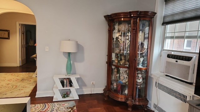 117-01 Park Ln S Unit B2L, Kew Gardens, NY 11415 - interior details with baseboards, arched walkways, and radiator