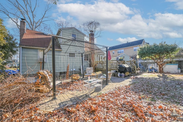 back of house with a patio area