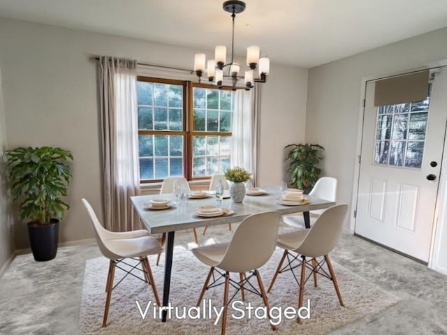 dining room with a chandelier