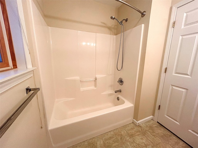 bathroom with shower / bath combination