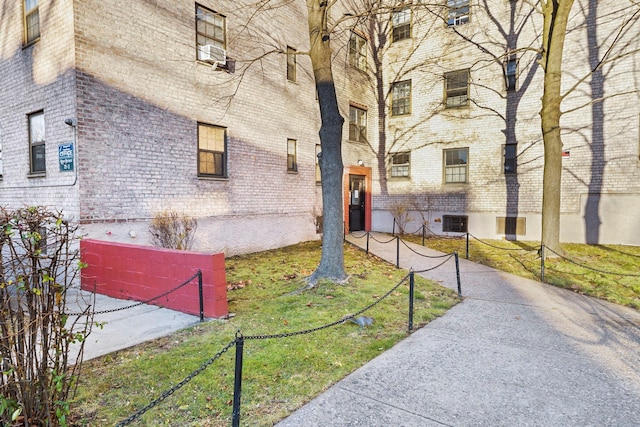 view of building exterior with cooling unit