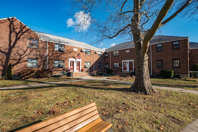 exterior space featuring a front lawn