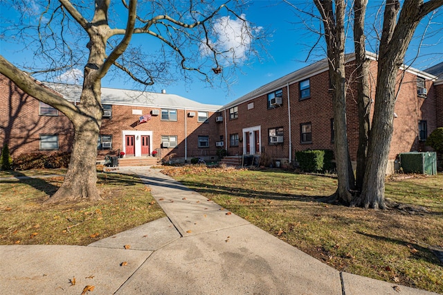 view of community with a yard