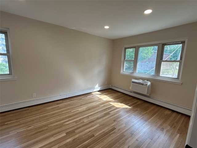 665 Pelham Rd Unit A15, New Rochelle, NY 10805 - unfurnished room featuring light wood-style flooring, recessed lighting, and an AC wall unit