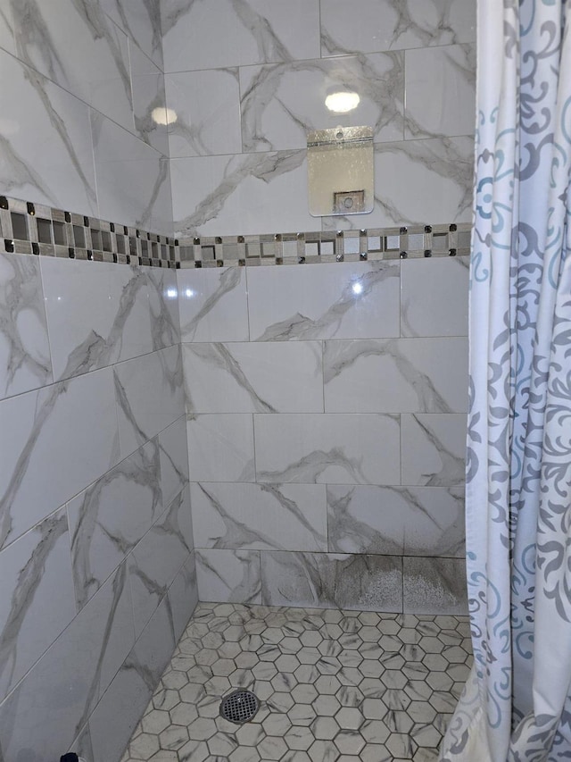 bathroom with curtained shower