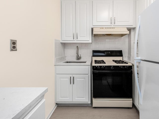 kitchen featuring sink, white appliances, white cabinetry, and custom exhaust hood