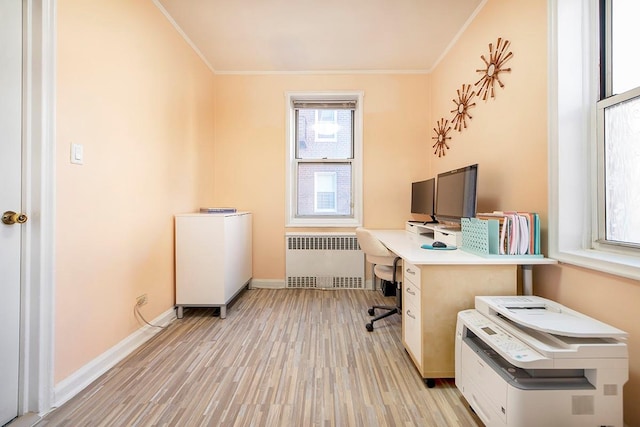 office with crown molding, radiator heating unit, and light hardwood / wood-style floors