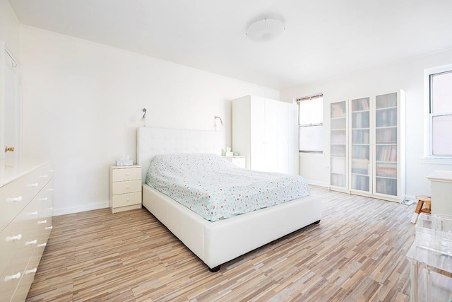 bedroom featuring light hardwood / wood-style flooring