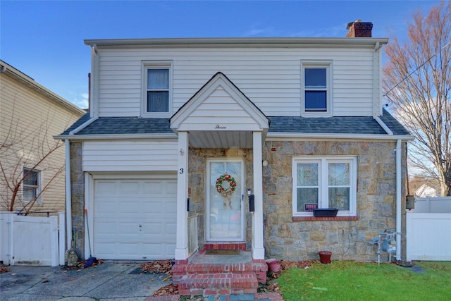 view of front of home with a garage