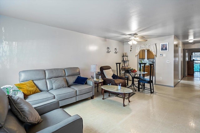 living room with ceiling fan