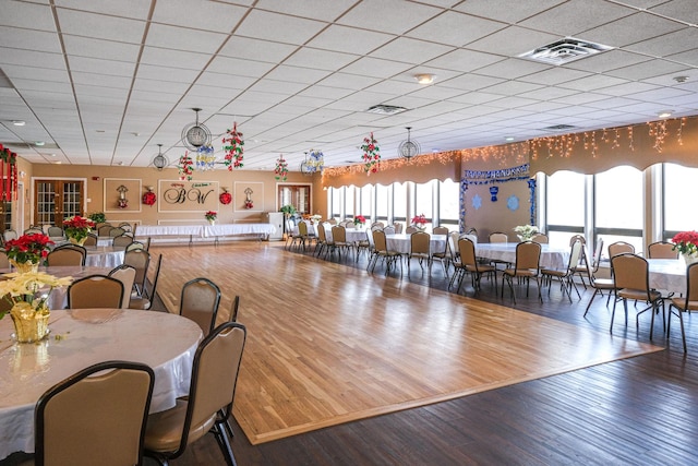 dining room with wood-type flooring