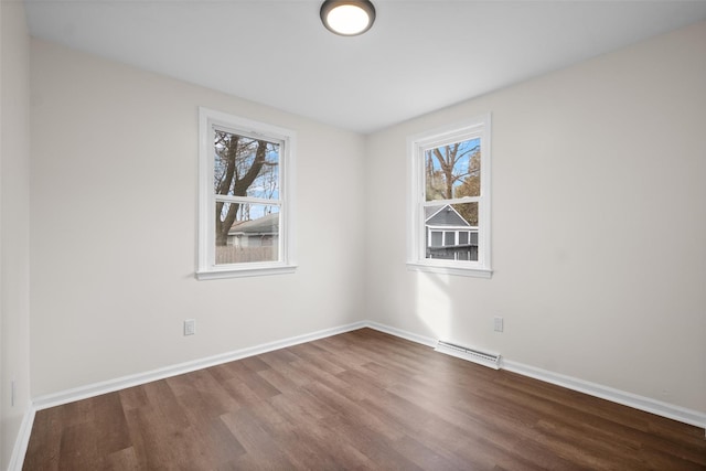 unfurnished room featuring hardwood / wood-style floors