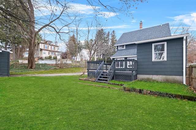 view of yard featuring a deck