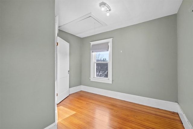 empty room with wood-type flooring