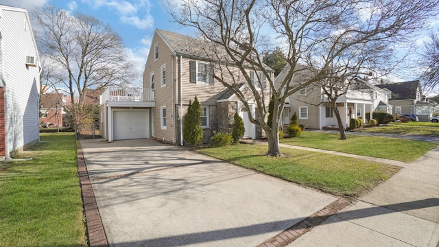 view of front facade featuring a garage and a front lawn