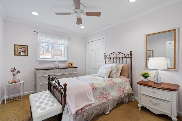 carpeted bedroom featuring baseboards, ornamental molding, a closet, and recessed lighting