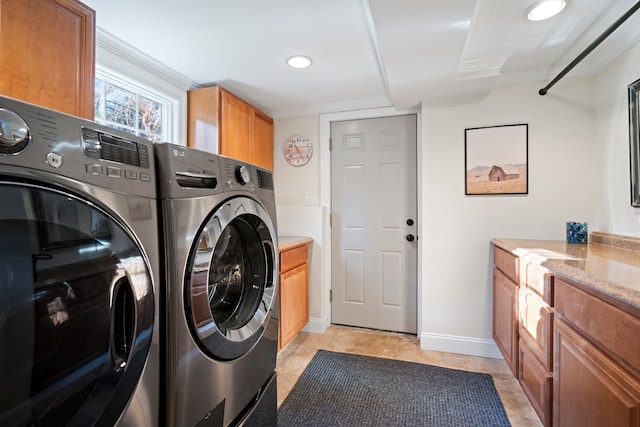 washroom featuring cabinet space, baseboards, washer and clothes dryer, crown molding, and recessed lighting