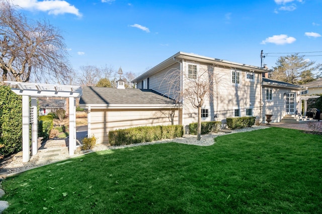 rear view of property with a lawn and a pergola