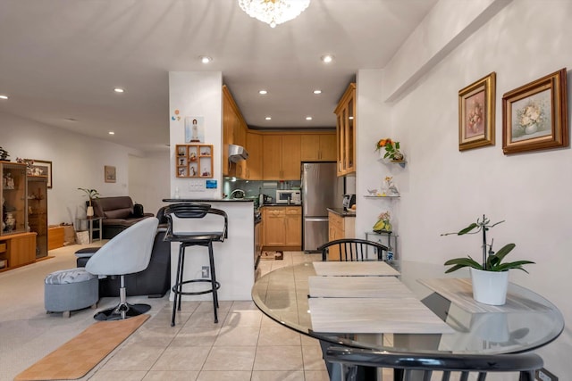 dining space with light tile patterned flooring