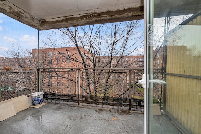 view of patio featuring a balcony