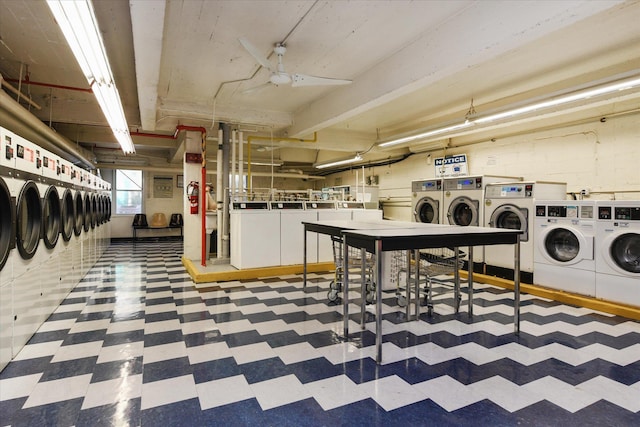 washroom featuring washer and clothes dryer and ceiling fan