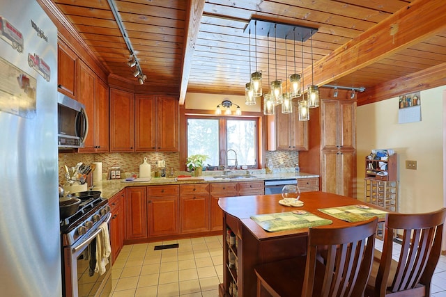 kitchen with beamed ceiling, decorative backsplash, hanging light fixtures, wood ceiling, and stainless steel appliances